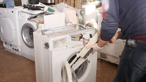 Master on Repair Washing Machine. Stock Footage 87026955