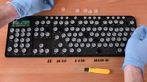 Master repairing computer keyboard Stock Footage 182065426