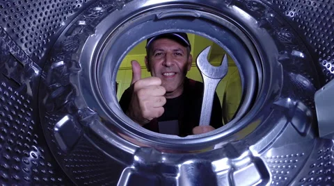 Master on Repairing Laundry Machine Stock Footage 51140025