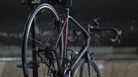 The master repairs the bike in the workshop Stock Footage 105877772