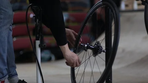 The master repairs the bike in the workshop Video stock 105877862