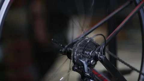 The master repairs the bike in the workshop Video stock 105877882