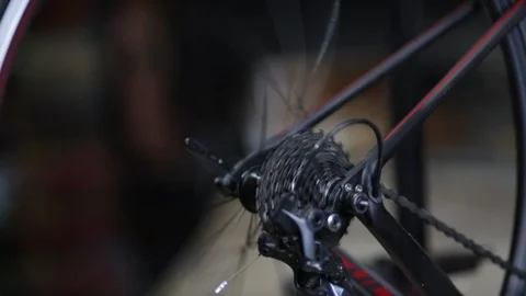 The master repairs the bike in the workshop Stock Footage 105877890