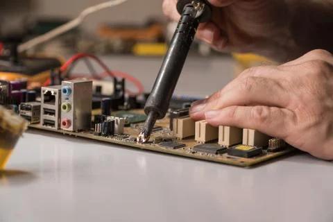 Master repairs chip Stock Photos