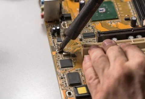 Master repairs chip Stock Photos
