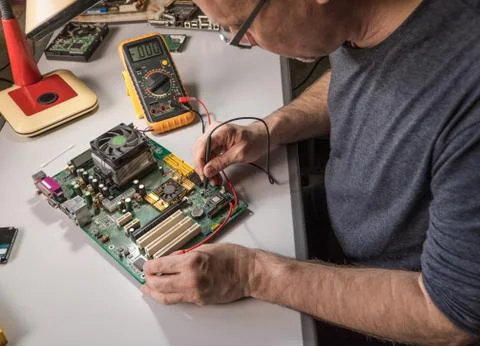 Master repairs chip Stock Photos