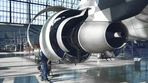 Master repairs the engine of a passenger aircraft. 4k Stock Footage 107285468