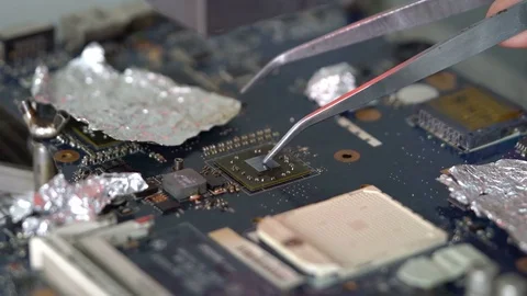 Master repairs the motherboard Stock Footage 70625337