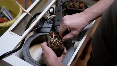 Master Repairs the Old Dirty, Rusty Kitchen Hood in the Kitchen. 4K. Close-up 스톡 동영상 229797231