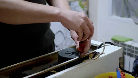 Master Repairs the Old Dirty, Rusty Kitchen Hood in the Kitchen. 4K. Close-up 스톡 동영상 236105790