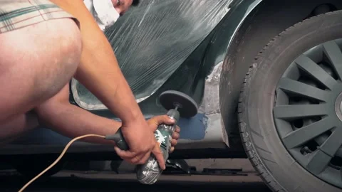 Master repairs the thresholds and cleans them with a special sander or grinder. Stock Footage 157653671