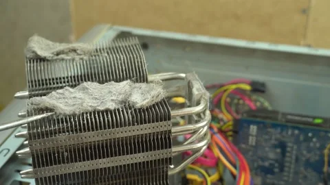 Master rotates dusty processor fan with a screwdriver. Stock Footage 130808379