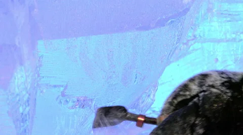 Master scraper performs a movement across the ice to create an ice sculpture Stock Footage 66314499