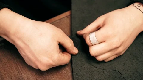 The master sews a leather bag, sewing of leather goods Video stock 151207843