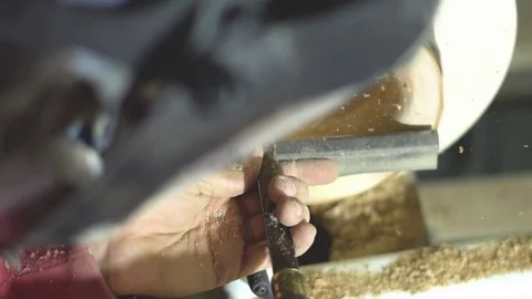 Master sharpening on a lathe wood Stock Footage 82811390