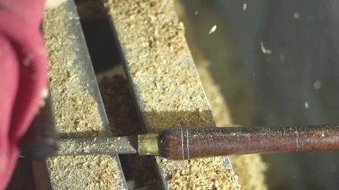Master sharpening on a lathe wood Stock Footage 82812328