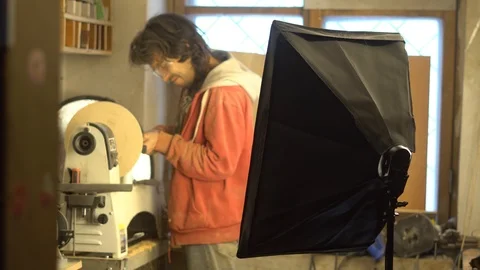 Master sharpening on a lathe wood Stock Footage 85723816