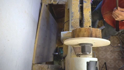 Master sharpening on a lathe wood Stock Footage 85725465