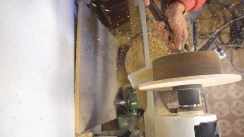 Master sharpening on a lathe wood Stock Footage 85785664