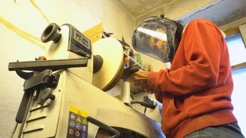 Master sharpening on a lathe wood Stock Footage 85786713