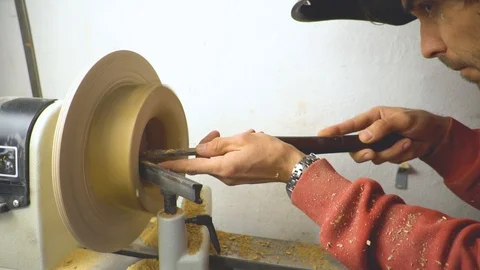 Master sharpening on a lathe wood Stock Footage 85926843
