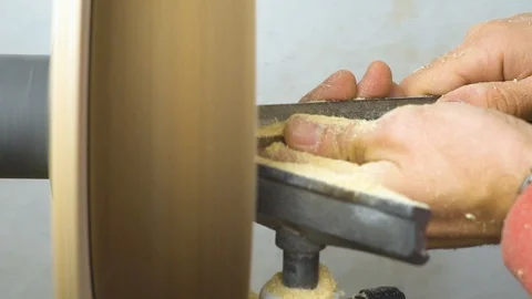 Master sharpening on a lathe wood Stock Footage 86678848