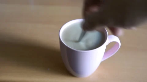 Master sharpens scissors for cutting hair Stock Footage 92437741