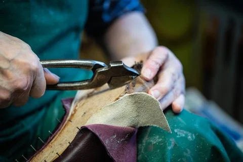 Master shoemaker producing shoes, master orthopedic, master orthopedic Stock Photos