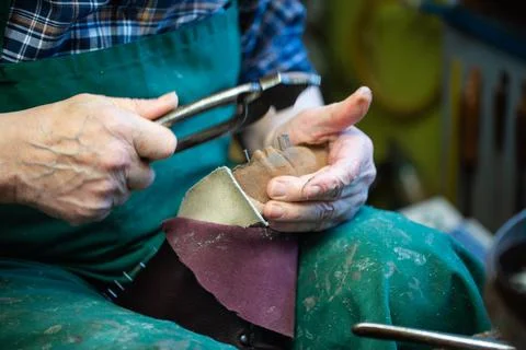 Master shoemaker producing shoes, master orthopedic, master orthopedic Stock Photos