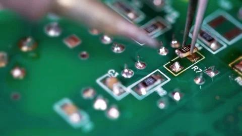 Master solder capacitor, close-up Stock Footage 74026269