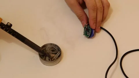 Master soldering contacts wiring Stock Footage 116505445