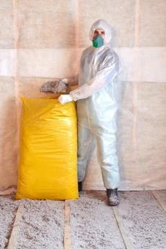 Master stacked cellulose insulation in the floor Stock Photos