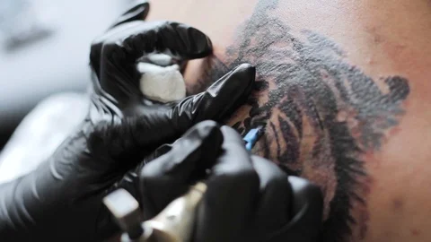 Master stuffs a tattoo Stock Footage 86288446