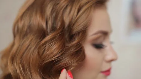 Master stylist makes the bride wedding hairstyle using spray lacquer fixing Stock-Footage 93690214