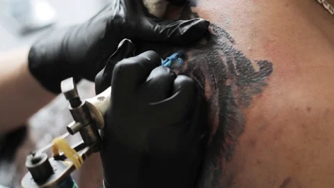 Master tattooed a tiger in the cabin Stock Footage 85663126