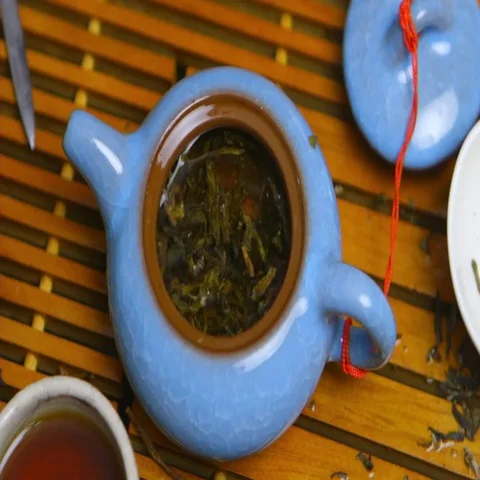 Master of tea does the tea ceremony with the tea set, da hong pao tea Stock Footage 69460573