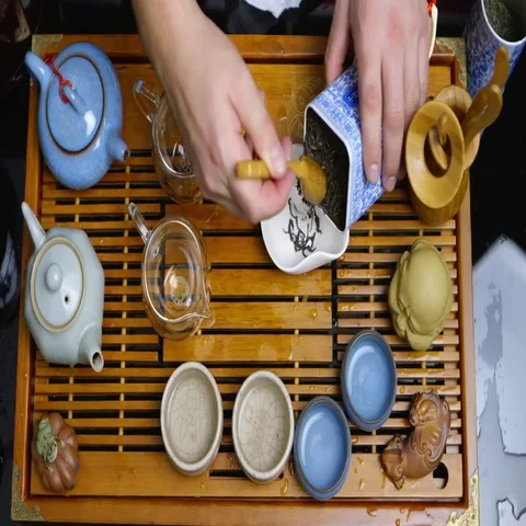 Master of tea does the tea ceremony with the tea set, da hong pao tea Stock Footage 69460718