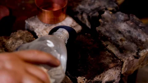 The master tempers, cools the heated product with water. Stock Footage 124572669