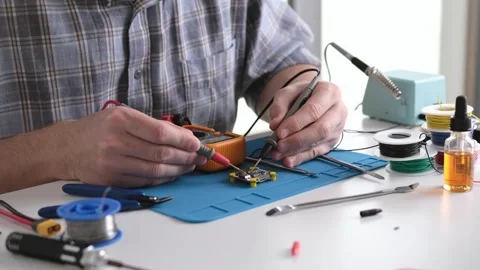 Master Is Testing Electrical Circuit Using Multimeter Stock Footage 312834960