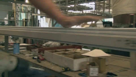 Master tightening the set screws into the frame Stock Footage 75155628