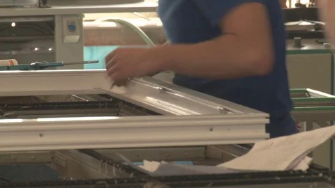 Master tightening the set screws into the frame Stock Footage 75156180