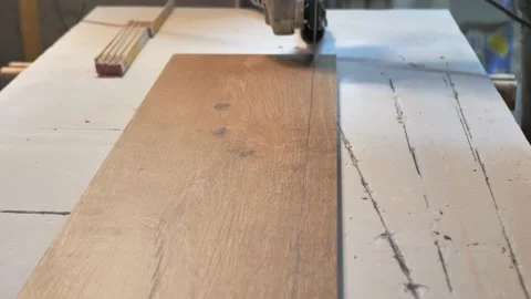 A master tiler cuts ceramic tiles. close up Stock Footage 172370837