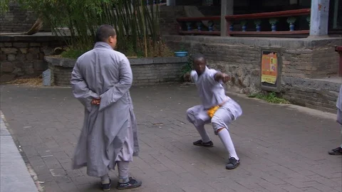 Master training Shaolin monk in Kung Fu Stock Footage 89813234