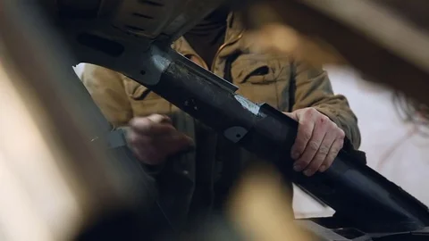 Master tries to replace a part in the car after the accident. Body Repair 스톡 동영상 76226801