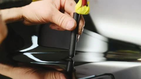 Master uses slide hammer and knockdown tool to complete task Stock Footage 316181412
