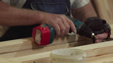 Master is using the instrument to make window frame at the carpentry facility Stock Footage 196709262