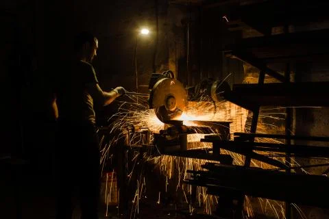 Master welder at work in the industrial shop. Stock Photos