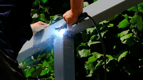 The master welds metal. selective focus. Stock Footage 265293520