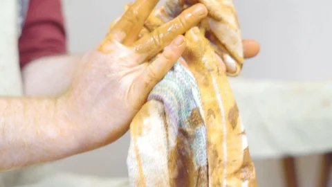 Master wipes his hands after work Stock Footage 95887643