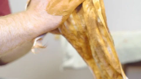 Master wipes his hands after work Stock Footage 95976735